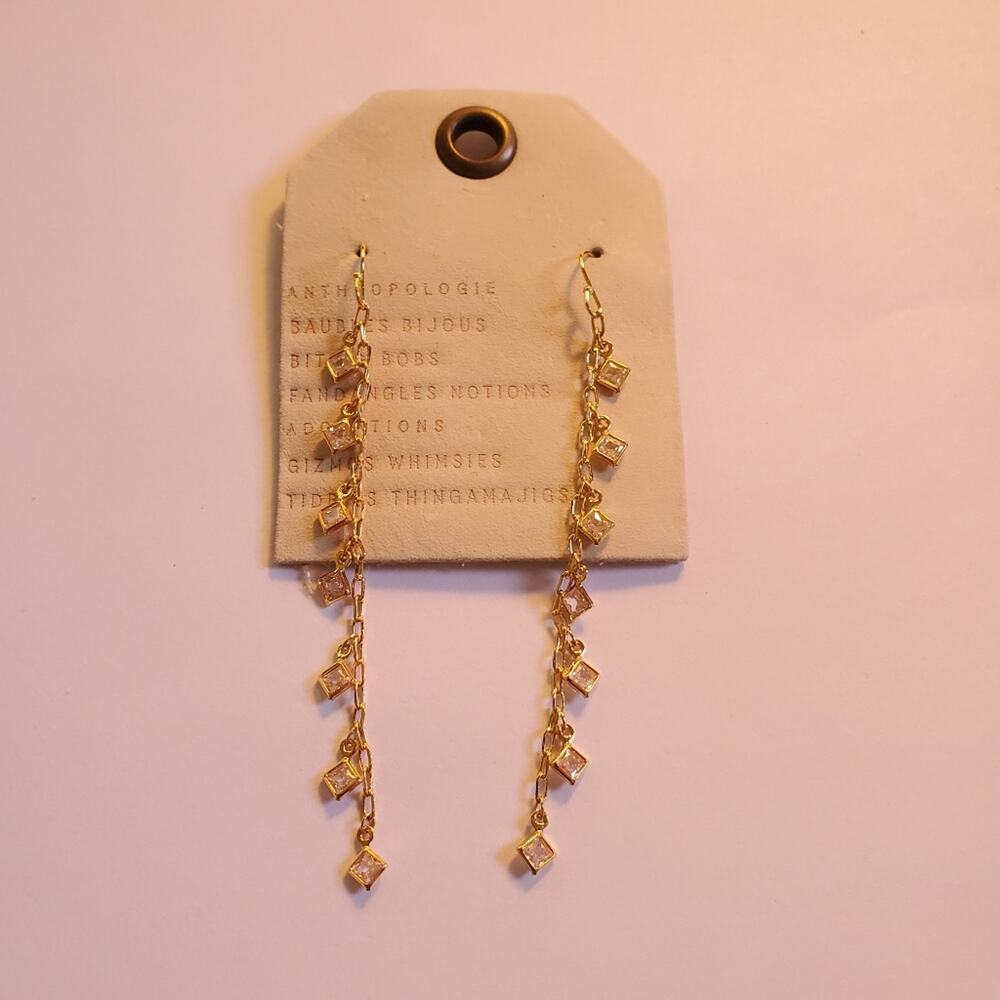 Anthropologie hook dangling gold over brass Small rhinestone details 3.25" Long